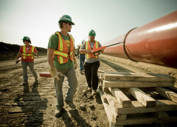 Three PSSI employees in the field.