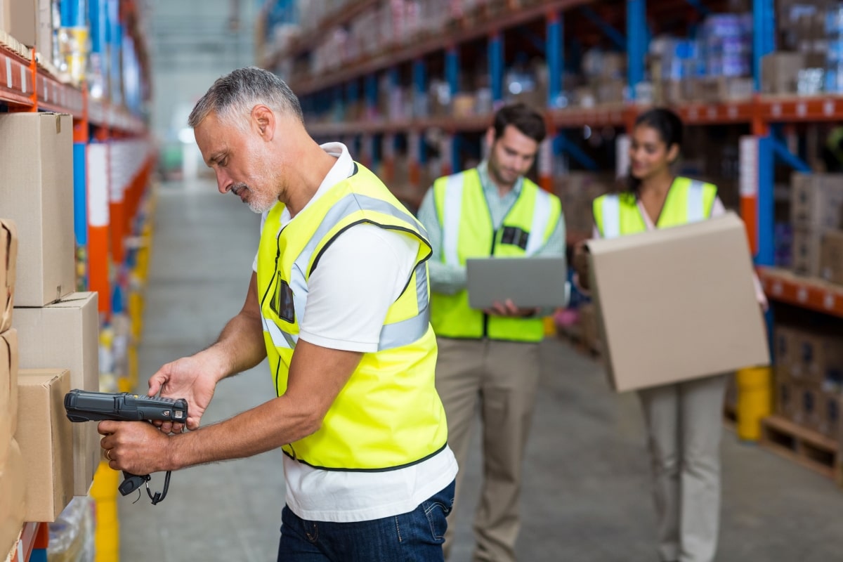 A worker scanning a box.