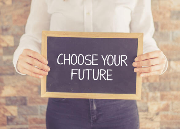 a PSS person holding a "Choose Your Future"  sign.