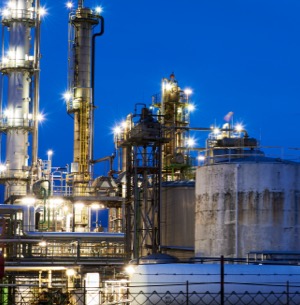 A picture of a petroleum plant at night.